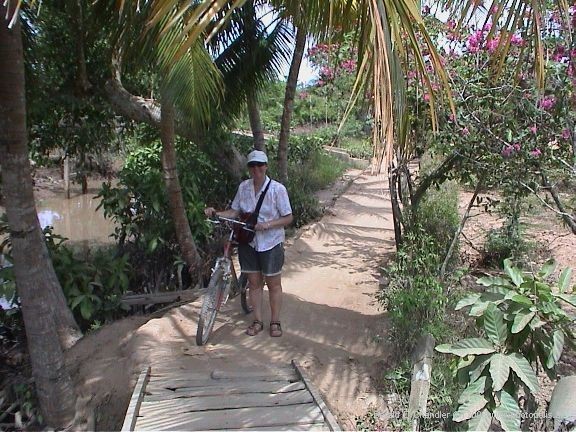 Jan with bike on dirt path