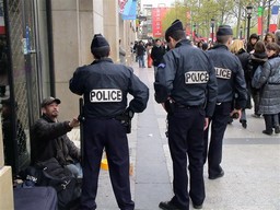 Policemen and beggar